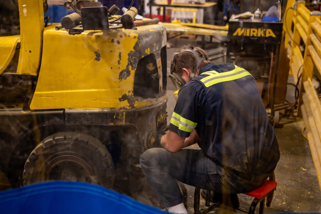 LiftOne OEM technician at work