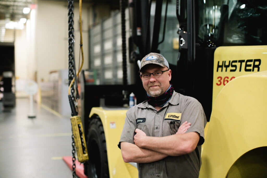 LiftOne technician with Hyster Machine